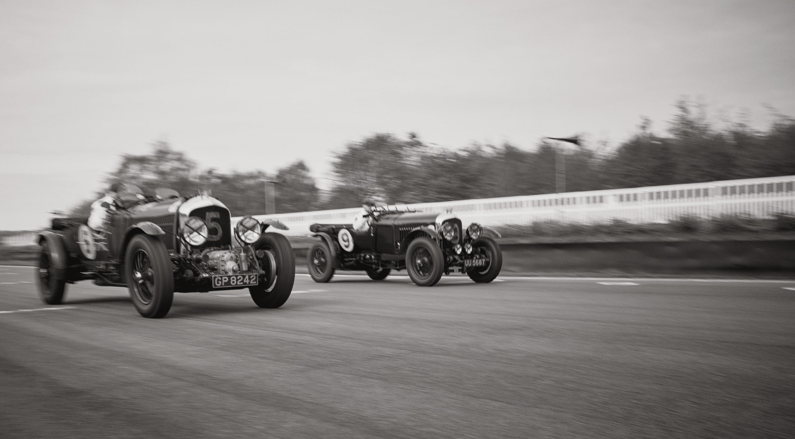<strong>ON LOCATION</strong><br/><span>This season of Polo Originals, inspired by the golden era of Grand Prix car racing, was photographed at the Goodwood Motor Circuit, which is located in West Sussex, on the 12,000-acre Goodwood Estate. The Circuit has since become known for hosting a number of prestigious motorsport events, including the famous Festival of Speed and Revival.</span> <br/><rlmag_link href="https://www.ralphlauren.global/tn/en/search?cgid=brands-prl-tough-and-refined-cg"><button class="shop-collection">Shop the Story</button></rlmag_link>